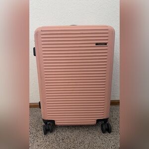 Calpak Peach Pink 25" Ridged Hardshell Carry-On Spinner Luggage